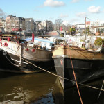 House boats along Amstel river.
