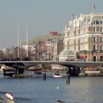 A view over the Amstel river towards the old city center, on the right hand the Amstel Hotel.